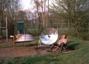 WOT-member Anton Bijl rests next to a solar dryer